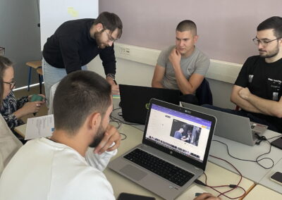 Photo of Menandros Ioannidis talking with a group of students from the University of Rijeka about the available Open GLASSroom resources.